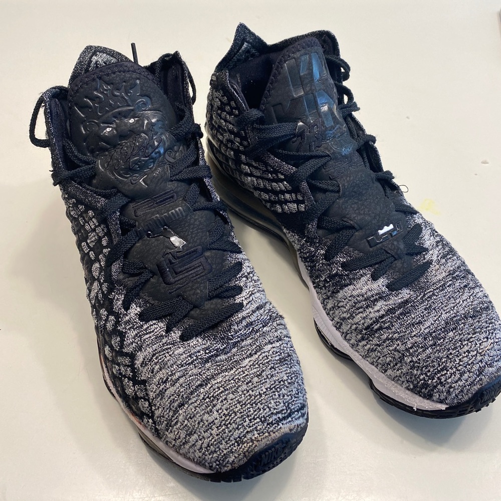 black and gray lebrons